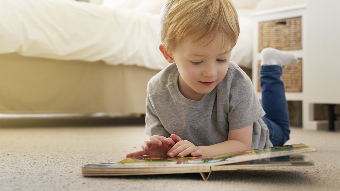 Kid reading book photo